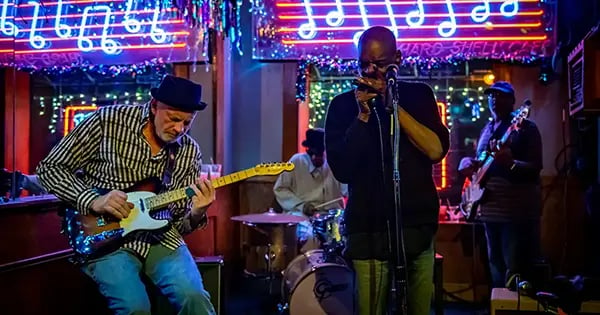 Rich McDonough (Guitar), Eric McSpadden(Harmonica), and Juan Abair (Drums) play at 1860 Saloon in Soulard