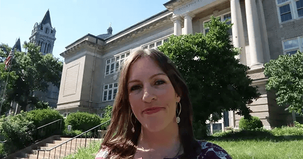 Michele Bildner in front of Rosati Kain Academy