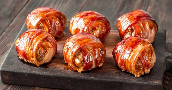 Bacon wrappped meatballs stuffed with cheese