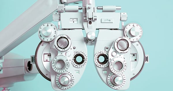 Close up of a phoroptor, an instrument used by eye care professionals during an eye examination.